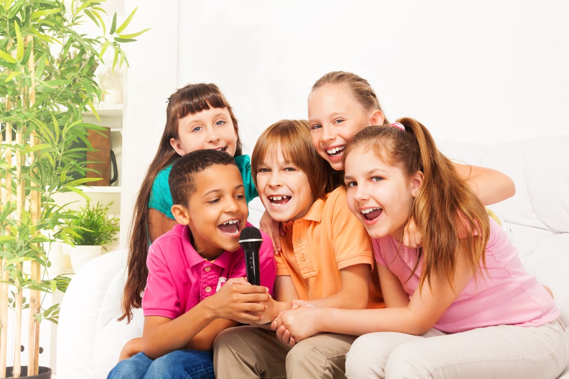 Group of Children Singing in Karaoke